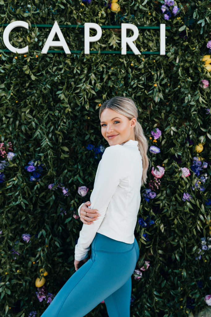 Witney Carson spotted in a white crop top and teal grey leggings as she  arrives at